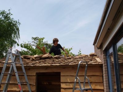 Tuinhuisjes - Tuinhuisje met een dak van Eiken shingles.